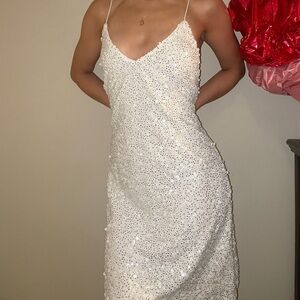 White sequin dress with open back